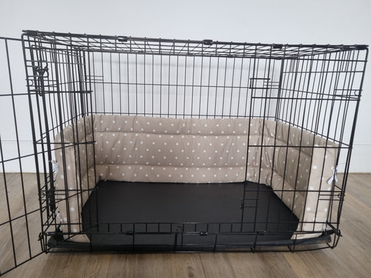 Dog crate bumper and bed - dog crate bedding. Taupe spotty design crate bumper pads attaching to metal dog crate to support with puppy training and dog crate training.