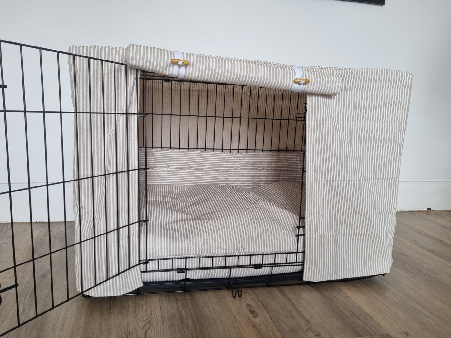 Dog crate set in neutral white striped ticking cotton fabric. Featuring aesthetic dog crate cover, crate bumper and mattress. A perfect training aid for dog crate training.