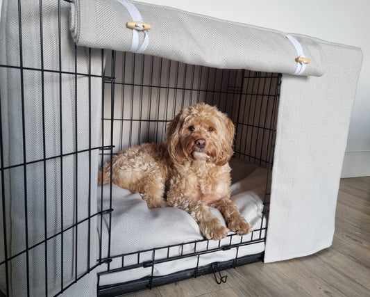 Stylish fabric dog crate cover. The custom kennel cover features a neutral-toned, aesthetic design with a herringbone pattern, offering a cosy and decorative touch to the pet's space.