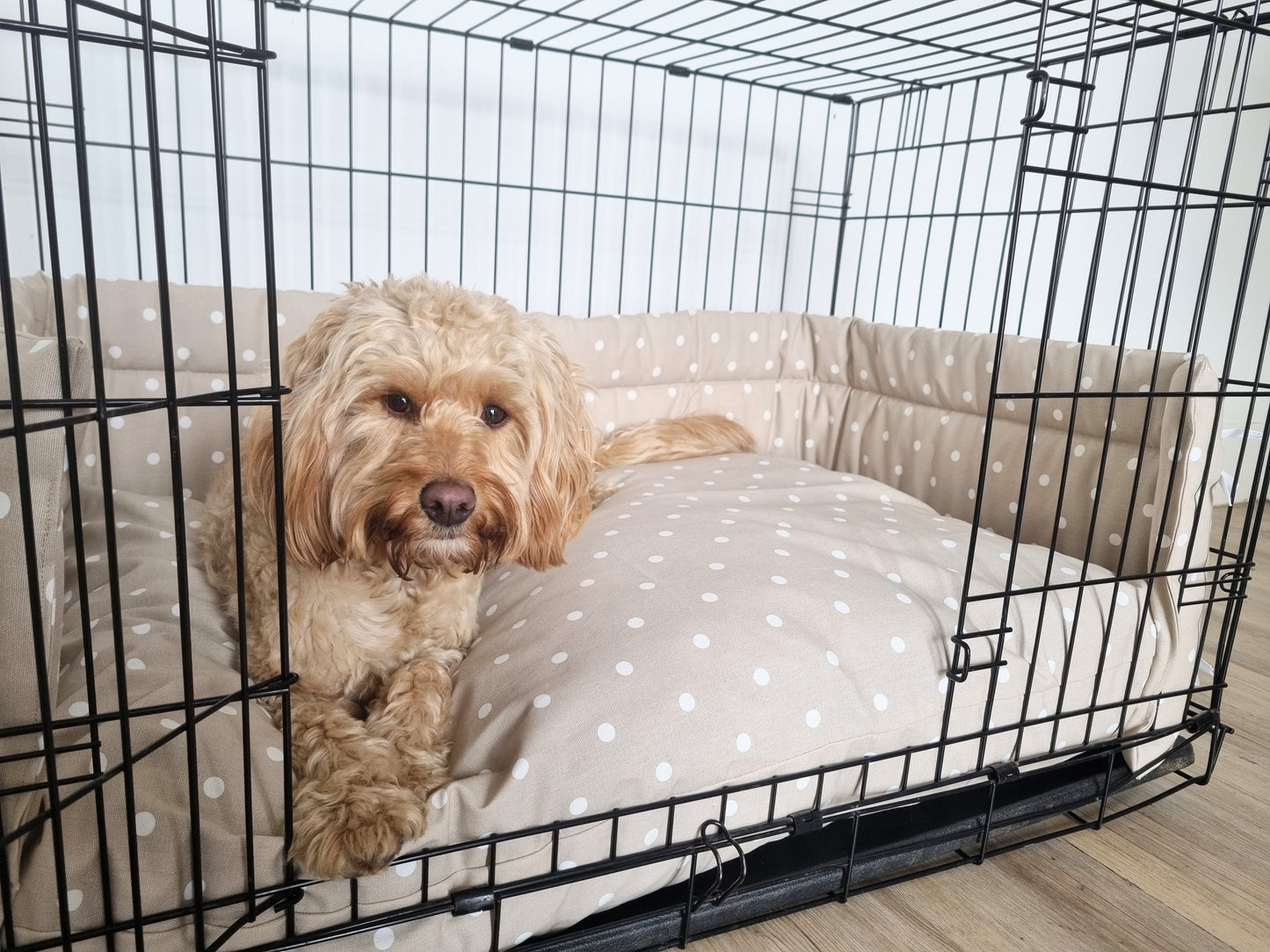 Dog crate bumper and mattress - dog crate bedding. Taupe spotty design crate bumper pads attaching to metal dog crate to support with puppy training and dog crate training. 