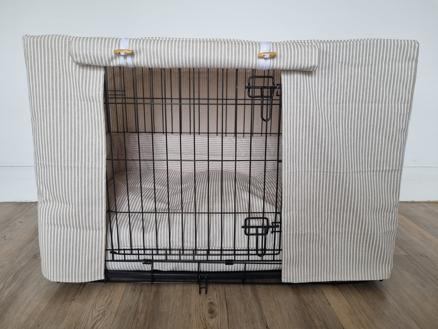 Dog crate set in neutral white striped ticking cotton fabric. Featuring aesthetic dog crate cover, crate bumper and mattress. A perfect training aid for dog crate training. 