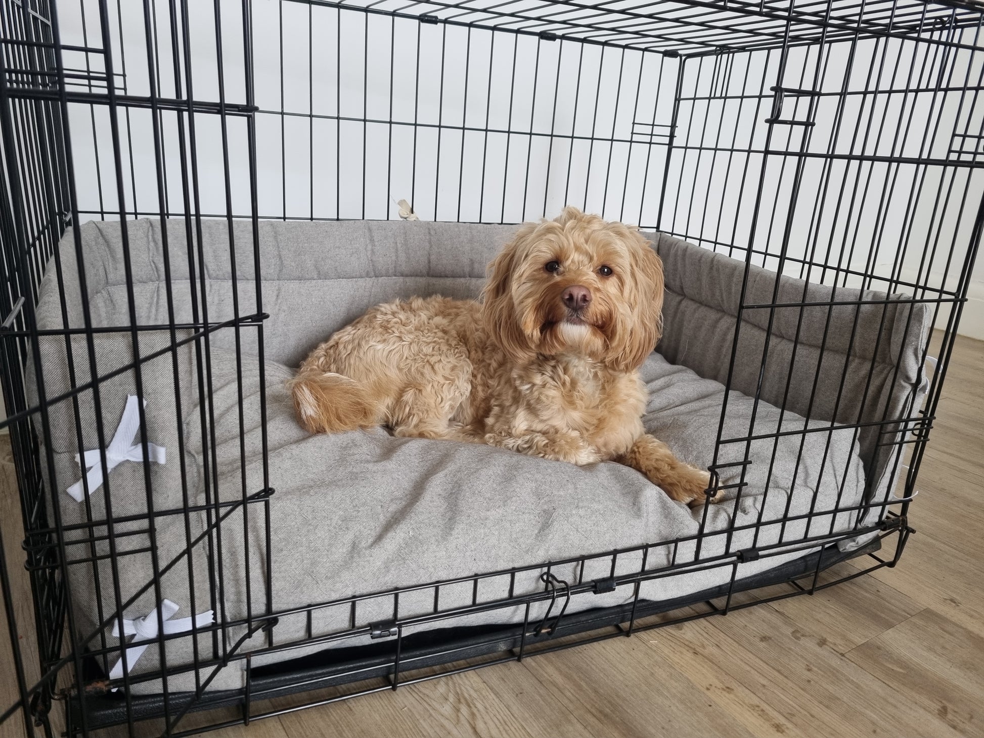 Dog crate bumper and bed - dog crate bedding. Grey linen-look cotton  design crate bumper pads attaching to metal dog crate to support with puppy training and dog crate training. 