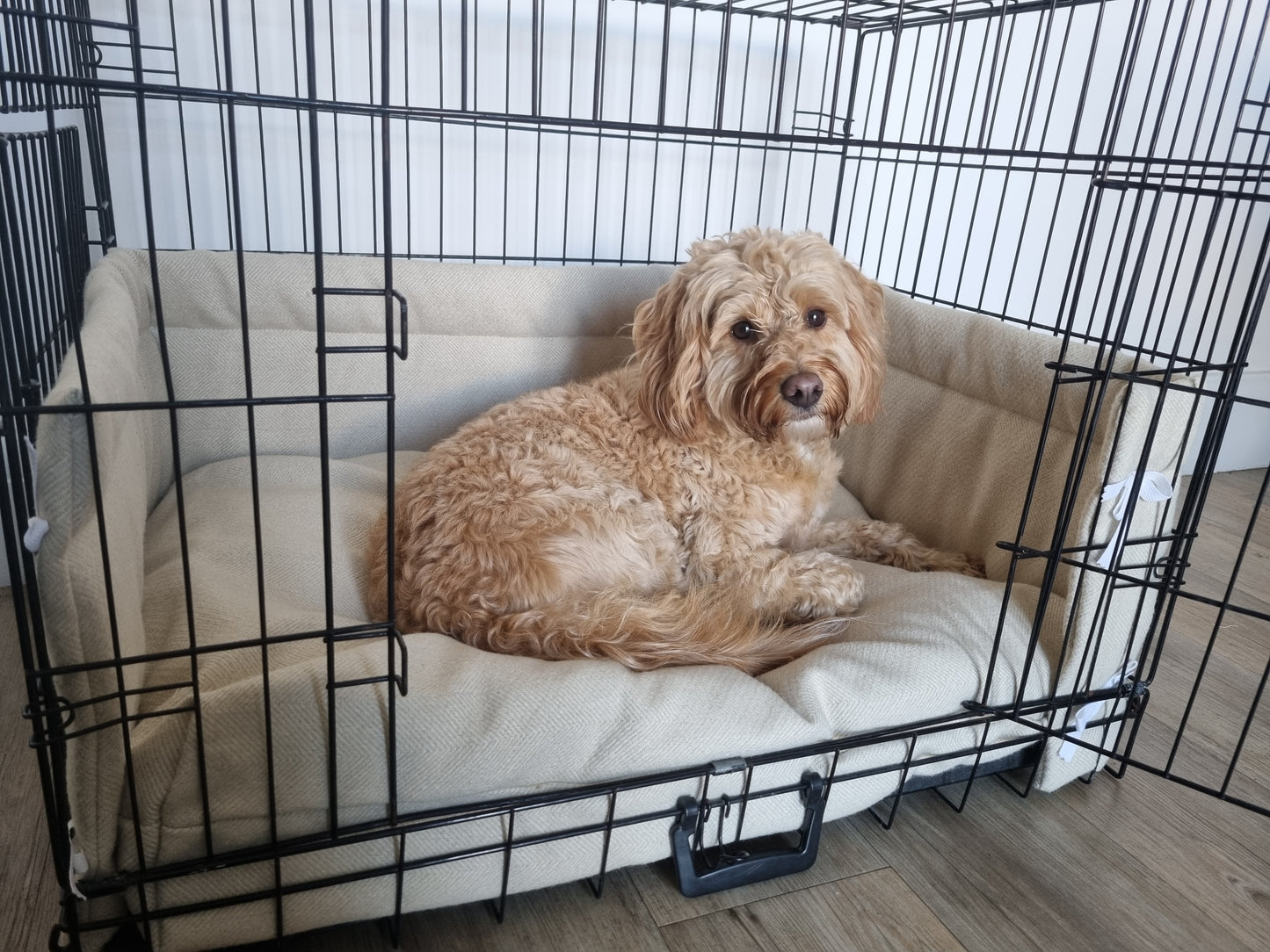 Dog crate bumper and bed - dog crate bedding. Cream herringbone dog crate bumper pads attaching to metal dog crate to support with puppy training and dog crate training. 