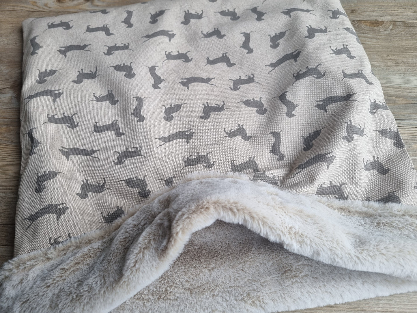 Personalised dachshund print snuggle sack for dogs. This neutral snuggle den provides comfort and warmth to all dogs, cats, guinea pigs. Cave den for dachshunds.