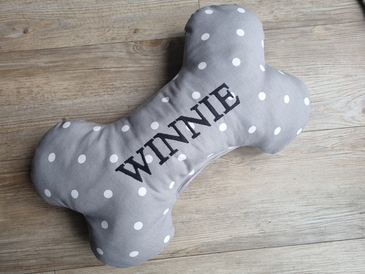 Personalised dog bone-shaped pillow. A neutral custom gift for dogs and puppies.