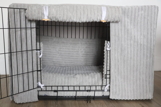 Dog crate set in super soft grey plush design. Featuring aesthetic dog crate bedding - cover, crate bumper and mattress. A perfect training aid for dog crate training. 